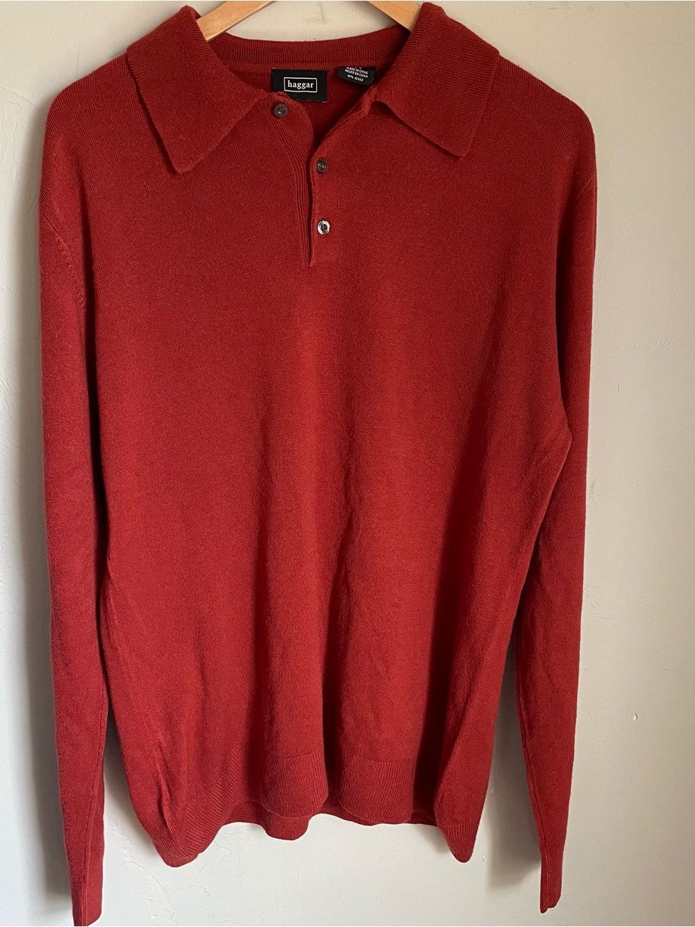 Haggar Men's long sleeve Polo Sweater in rust / brick red